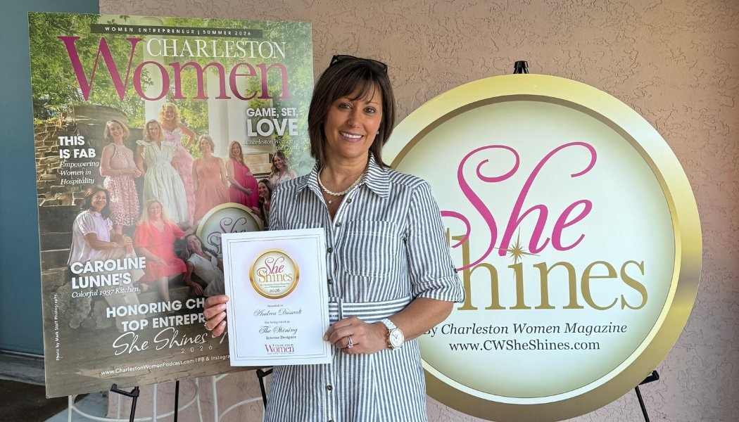 Andrea Dussault holding her 2026 She Shines award certificate