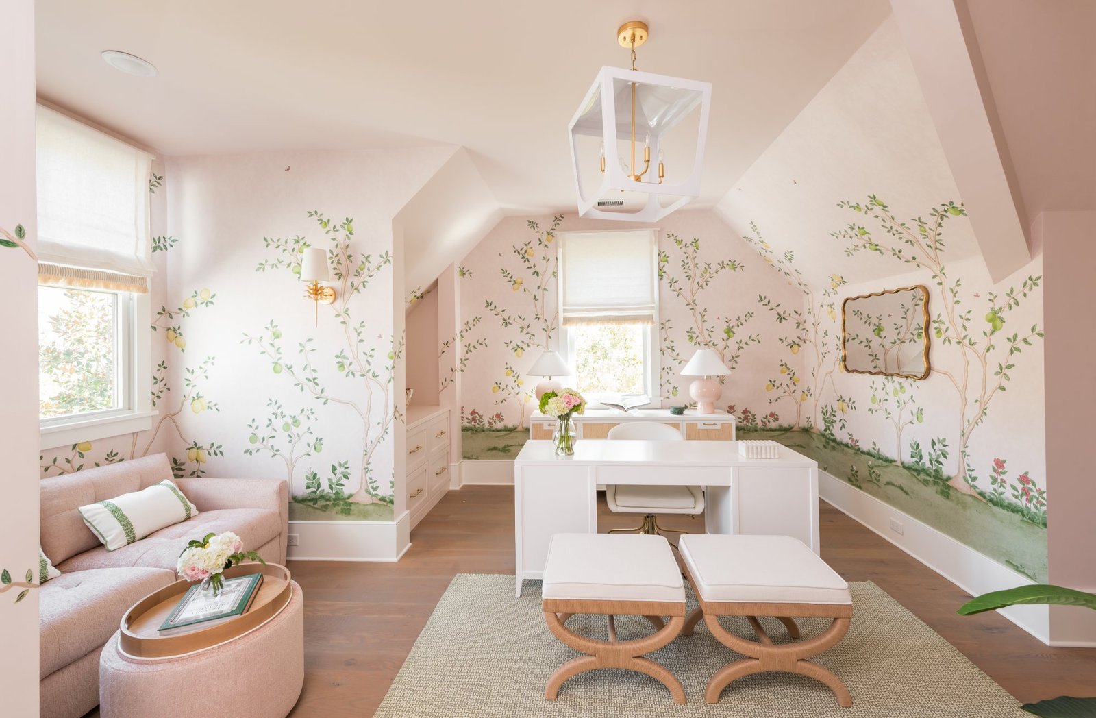 Blush mural study with white lacquer desk and rattan cabinetry