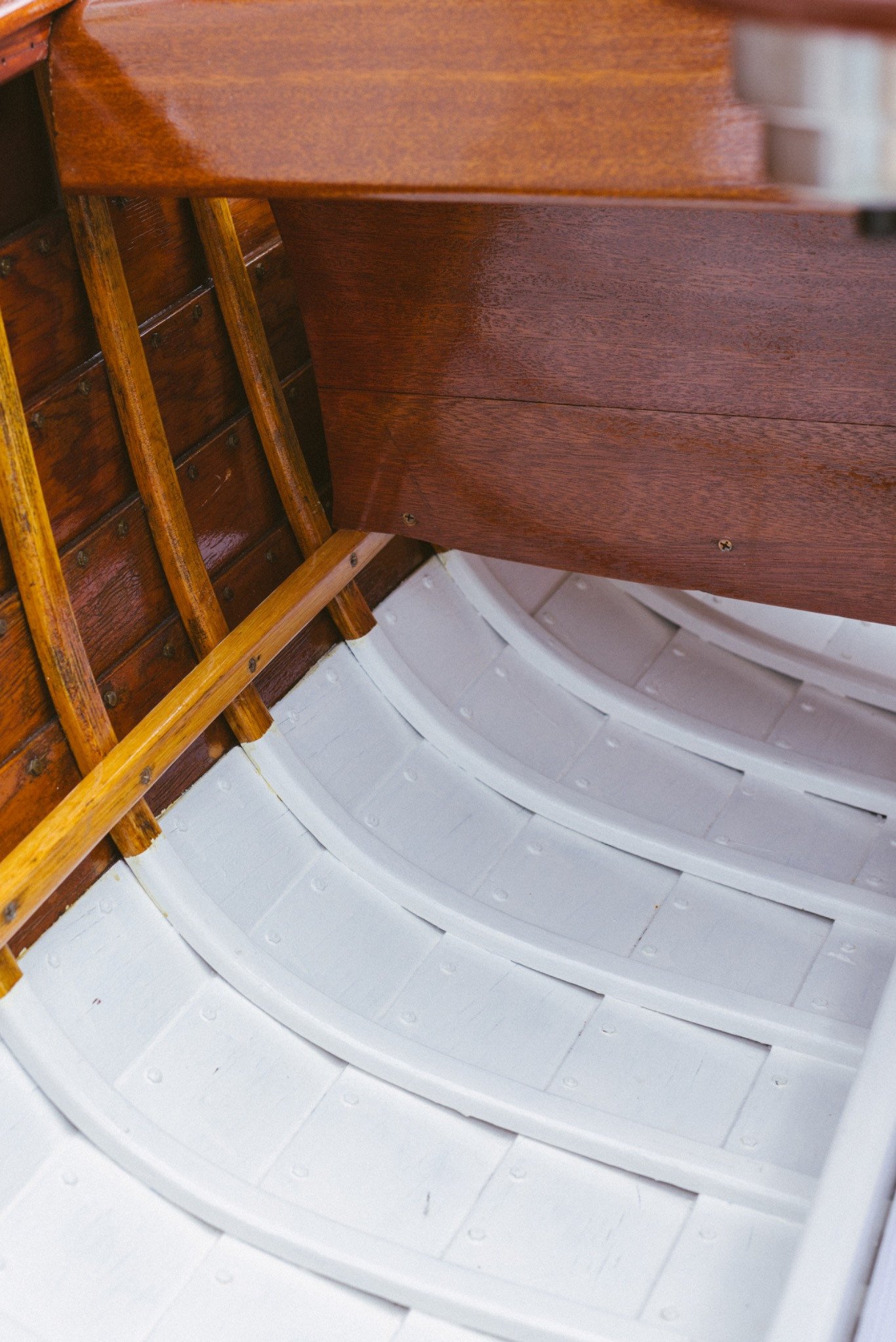 Original ribs and planking refinished, interior repainted white